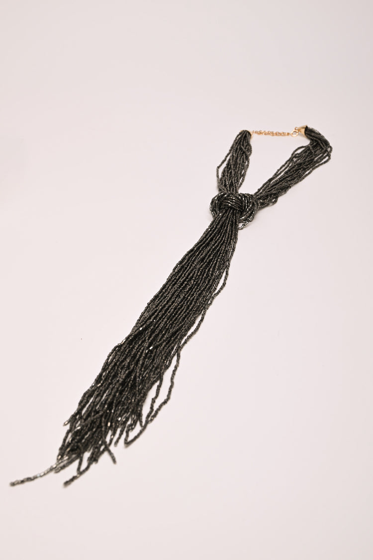 Multi-strand tie necklace
