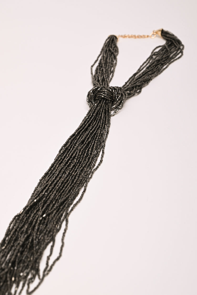 Multi-strand tie necklace