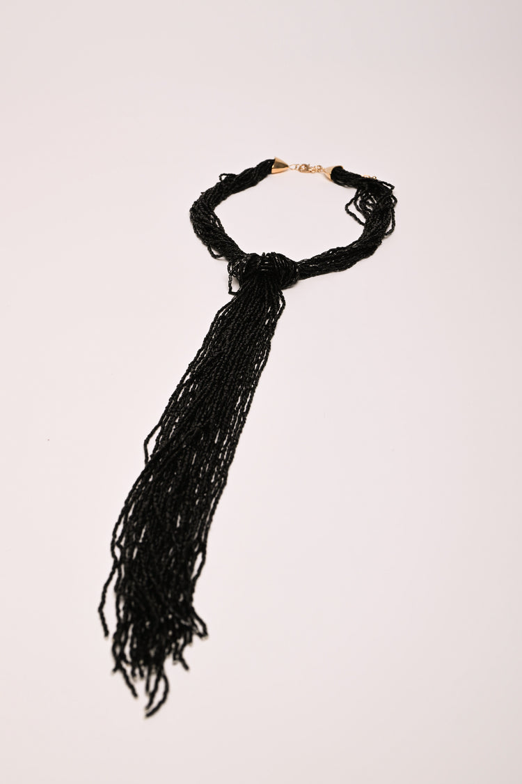 Multi-strand tie necklace