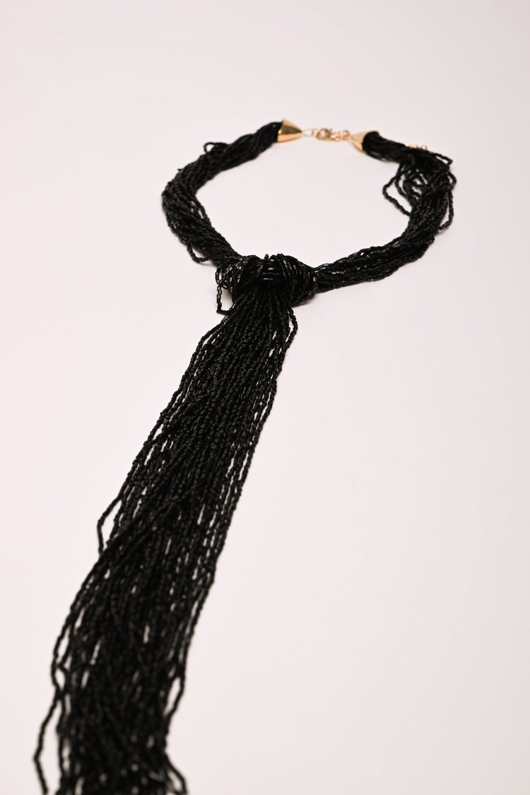 Multi-strand tie necklace