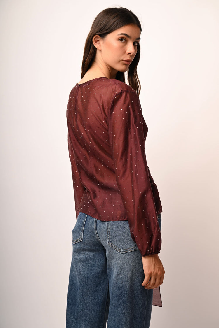 Rhinestone and bow muslin blouse