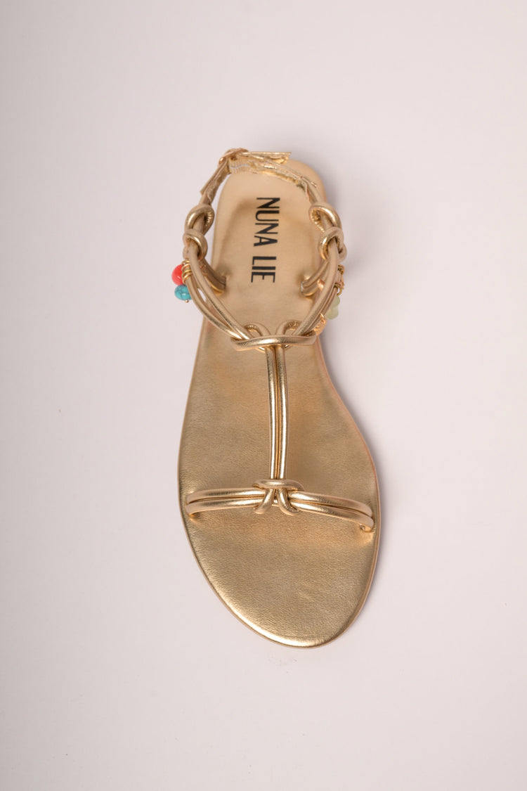 Charms detail golden flat sandals