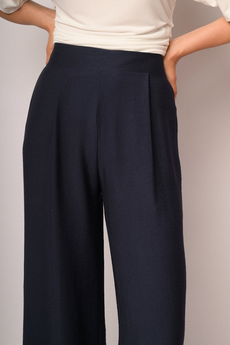 Blue palazzo trousers with turn-up hem