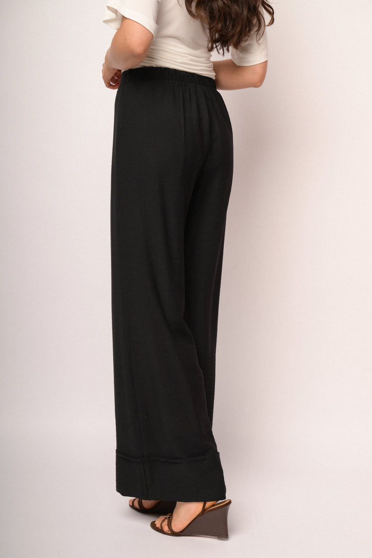 Black palazzo trousers with turn-up hem