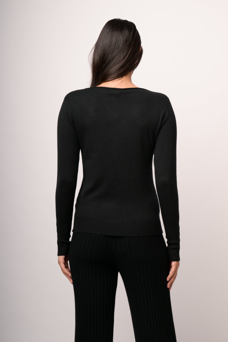 Black basic crew-neck sweater with gold-tone buttons