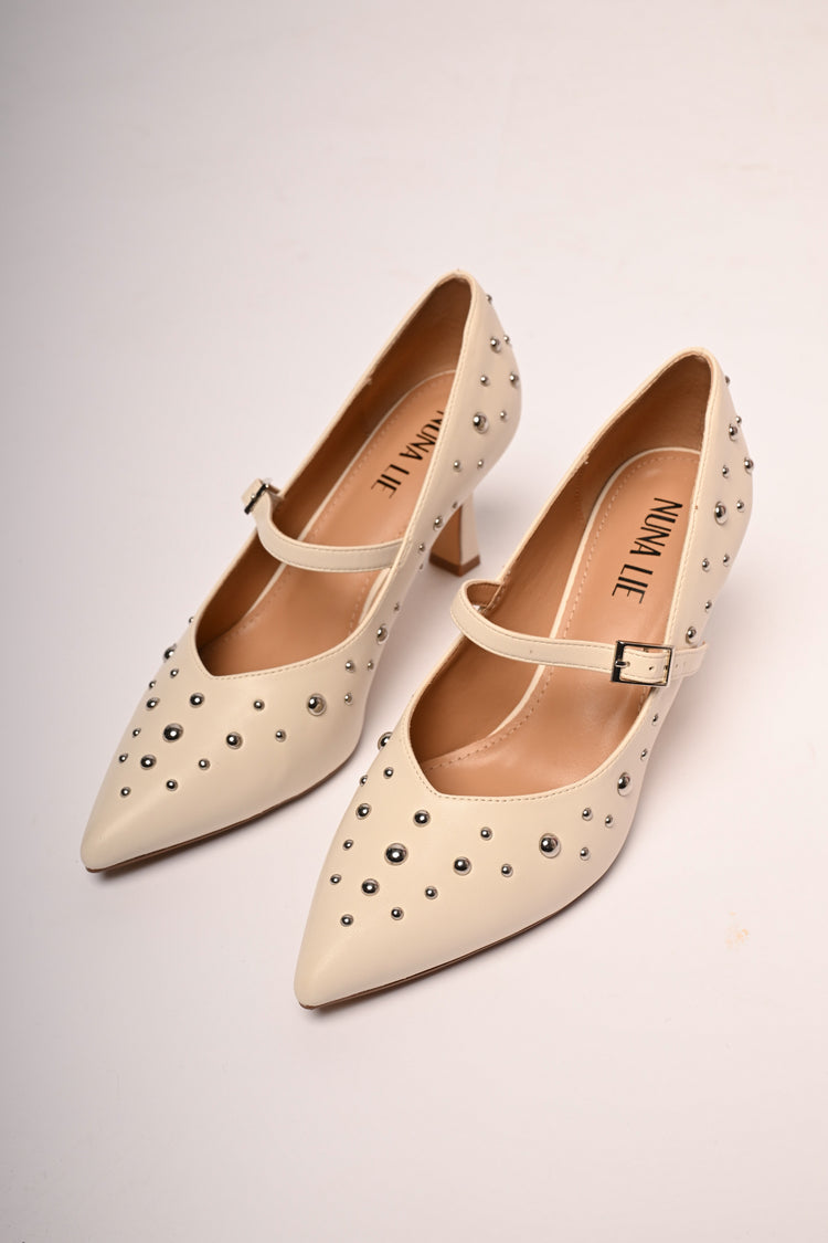 Stud-embellished pumps