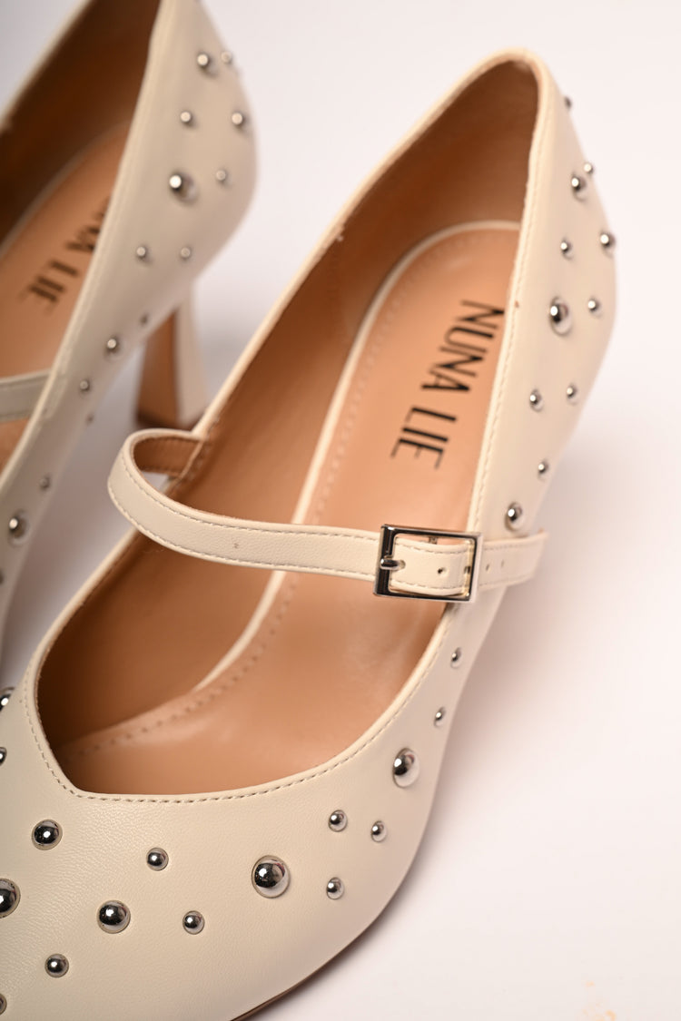 Stud-embellished pumps