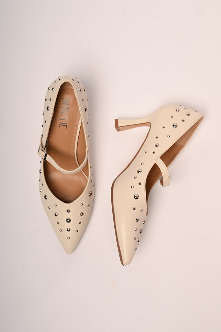 Stud-embellished pumps