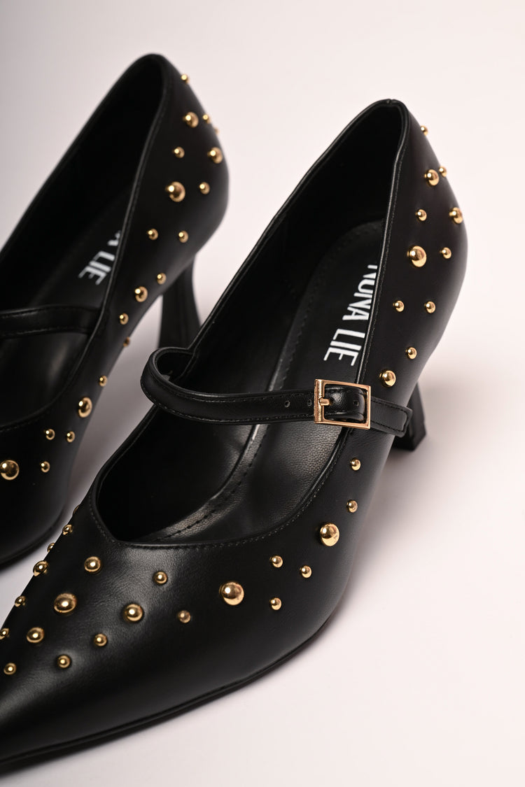 Stud-embellished pumps