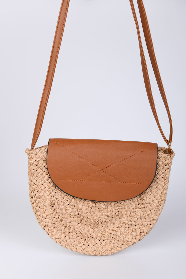 Rafia half-moon bag