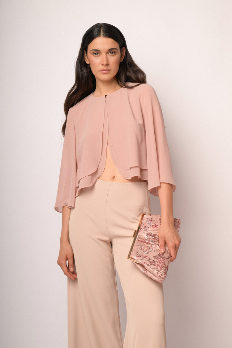 Pink bolero with button and cape sleeves