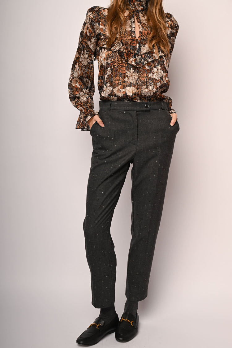 Laminated pinstriped trousers