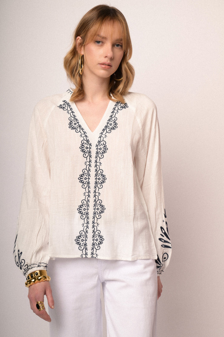 Black embroidered white cotton and viscose blouse