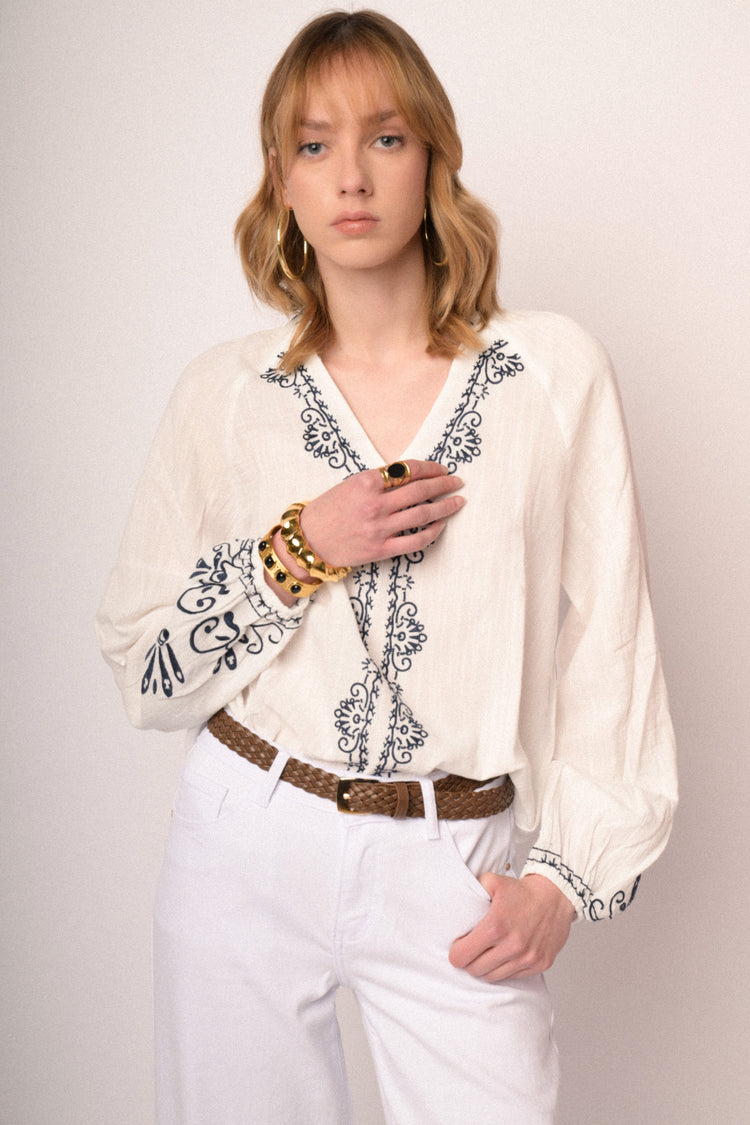 Black embroidered white cotton and viscose blouse