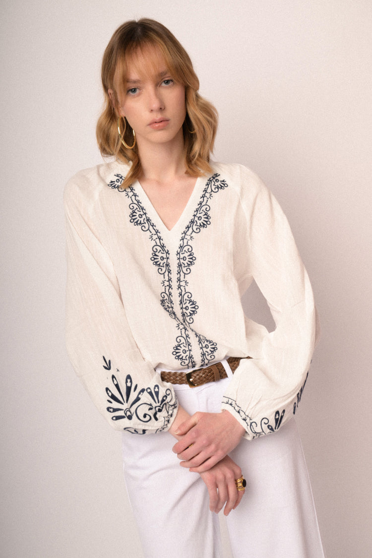 Black embroidered white cotton and viscose blouse