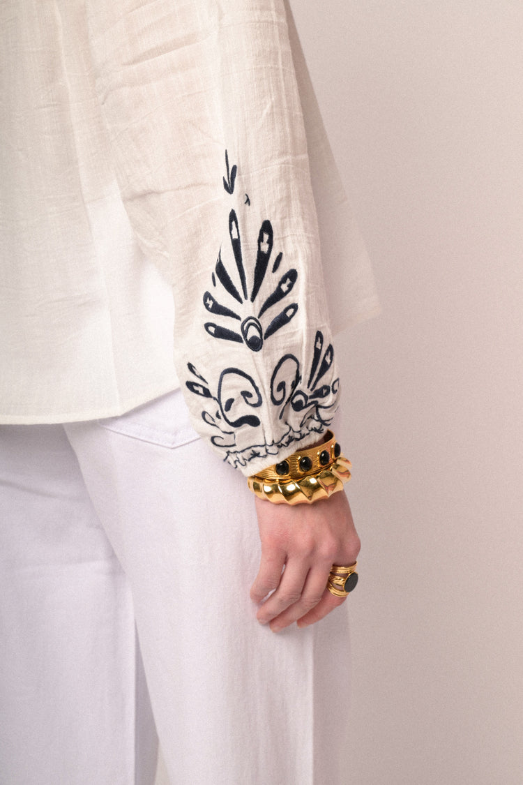 Black embroidered white cotton and viscose blouse