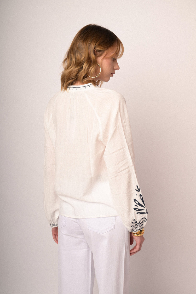 Black embroidered white cotton and viscose blouse
