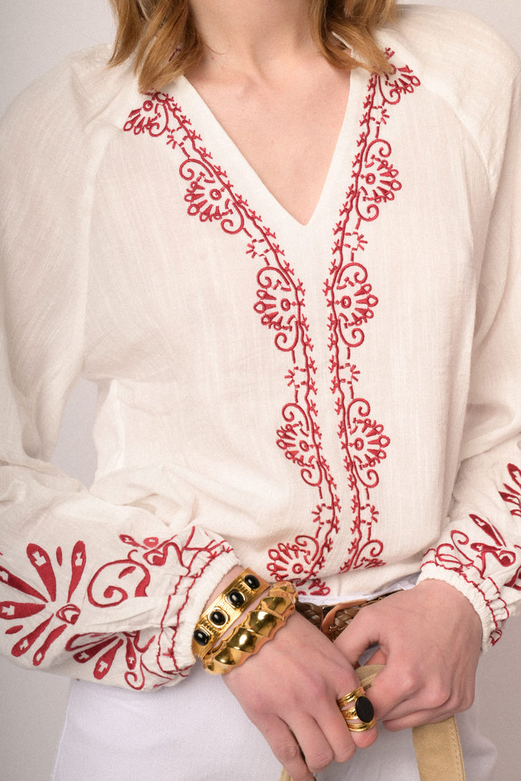 Red embroidered white cotton and viscose blouse