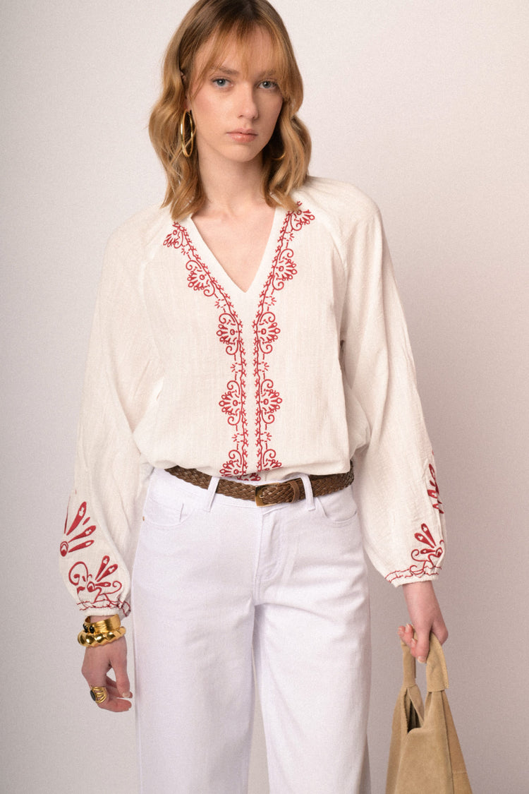 Red embroidered white cotton and viscose blouse