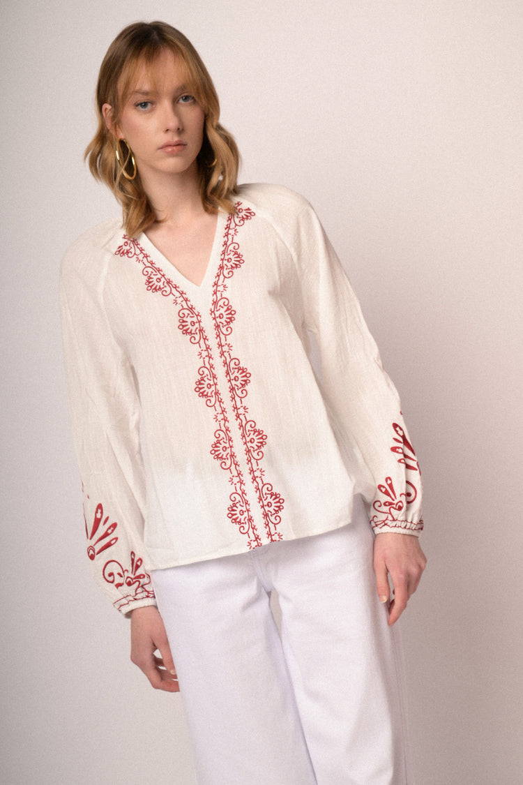 Red embroidered white cotton and viscose blouse