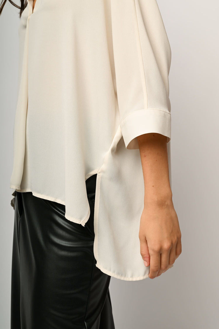 V-neck asymmetric blouse