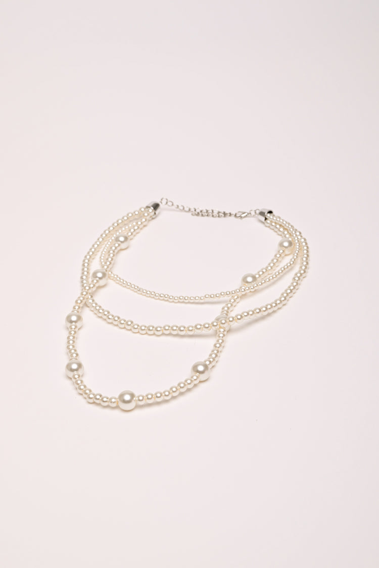 Triple strand beaded necklace