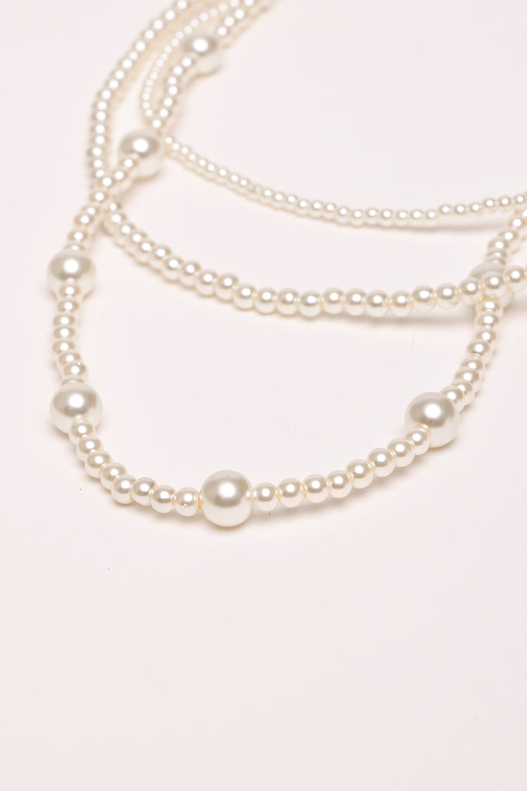 Triple strand beaded necklace