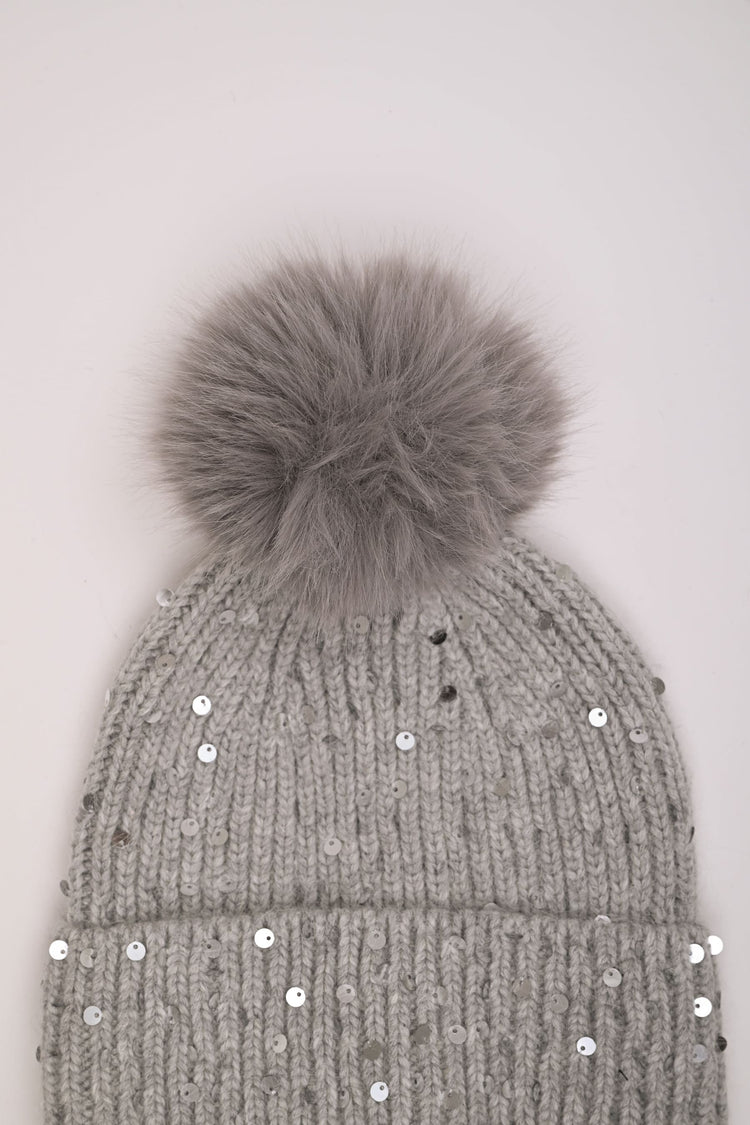 Pompon and sequin beanie