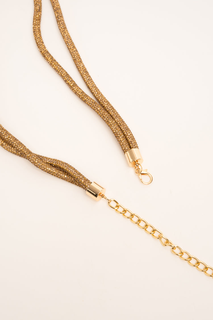 Golden rhinestone-embellished knot jewel belt