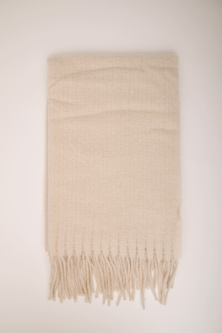 Fringed solid color scarf
