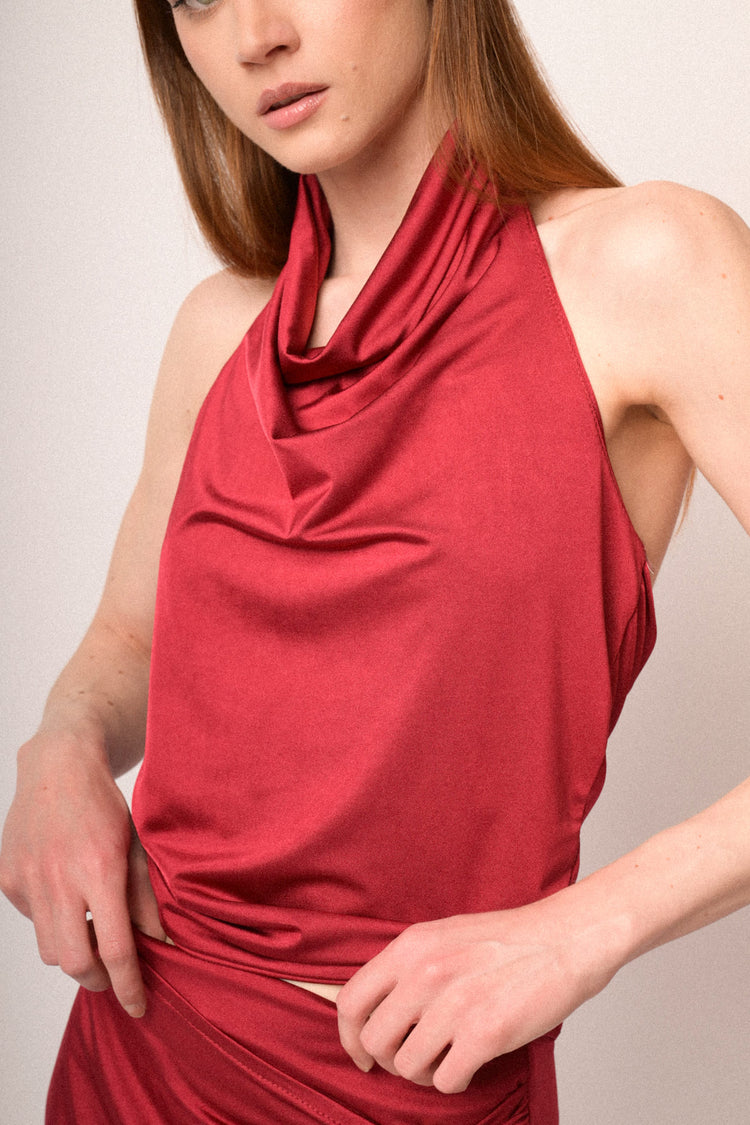 Red draped halter neck top