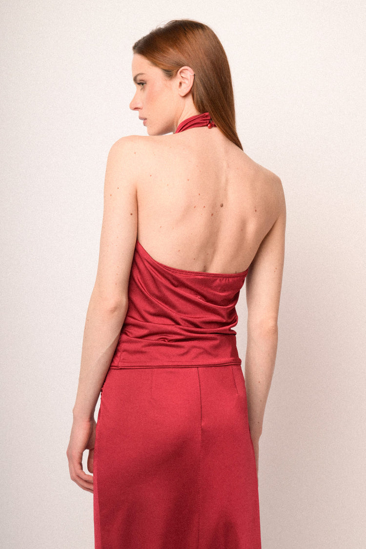 Red draped halter neck top