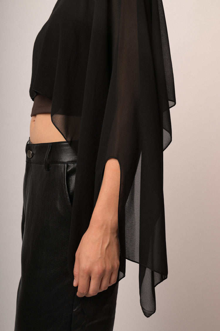 Black shrug with button and cape sleeves