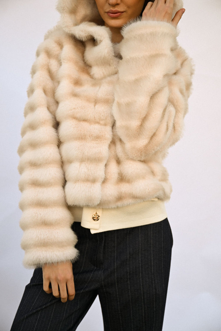 Hooded quilted faux fur jacket