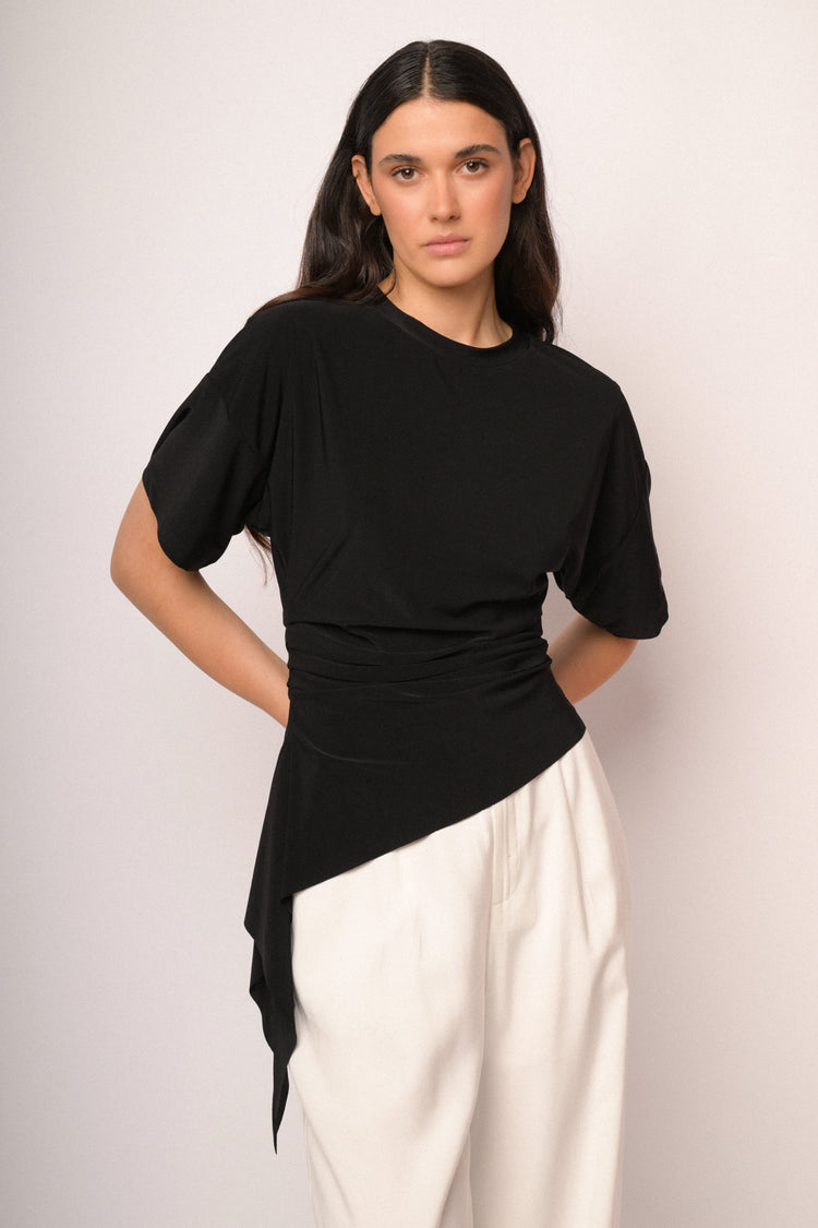 Black top with gathered detail and asymmetric hem