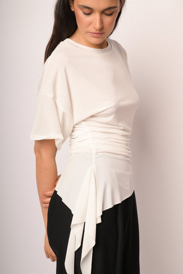 Ivory top with gathered detail and asymmetric hem