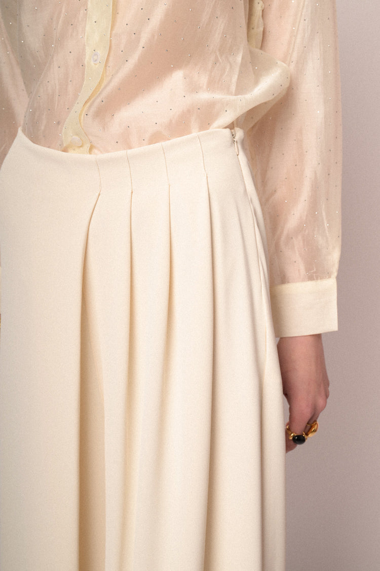 Ivory pleated wide-leg trousers