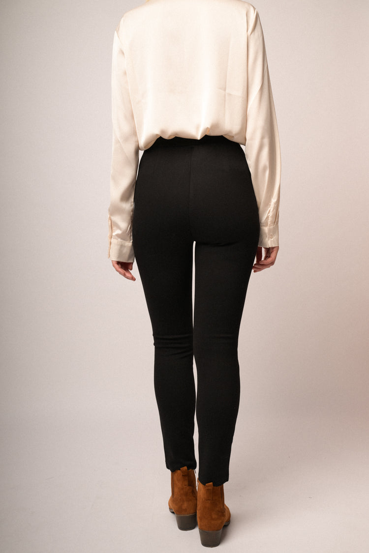 Leggings con applicazione sulla cintura