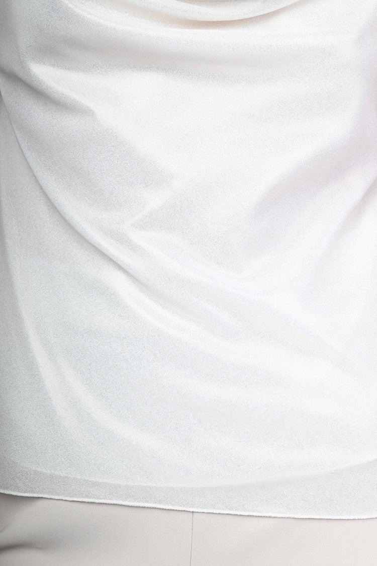 Laminated effect top