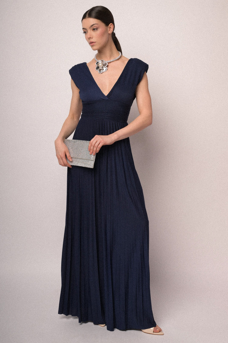 Navy blue pleated fabric gown