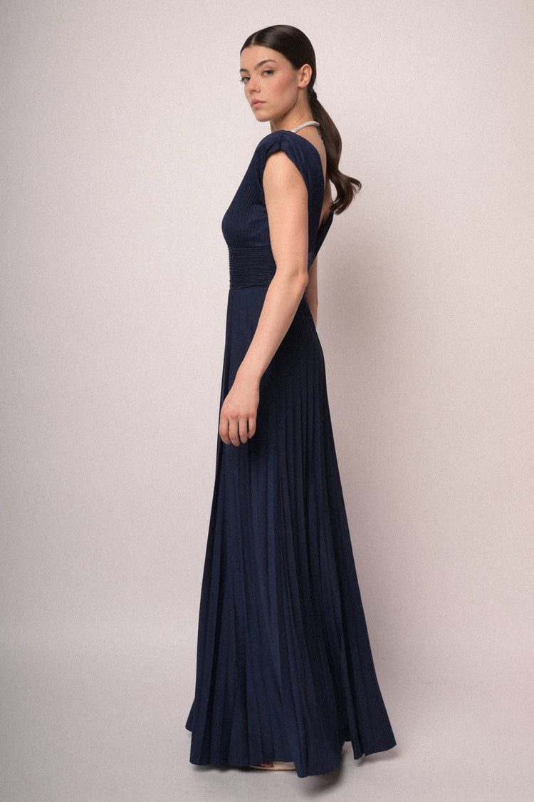 Navy blue pleated fabric gown