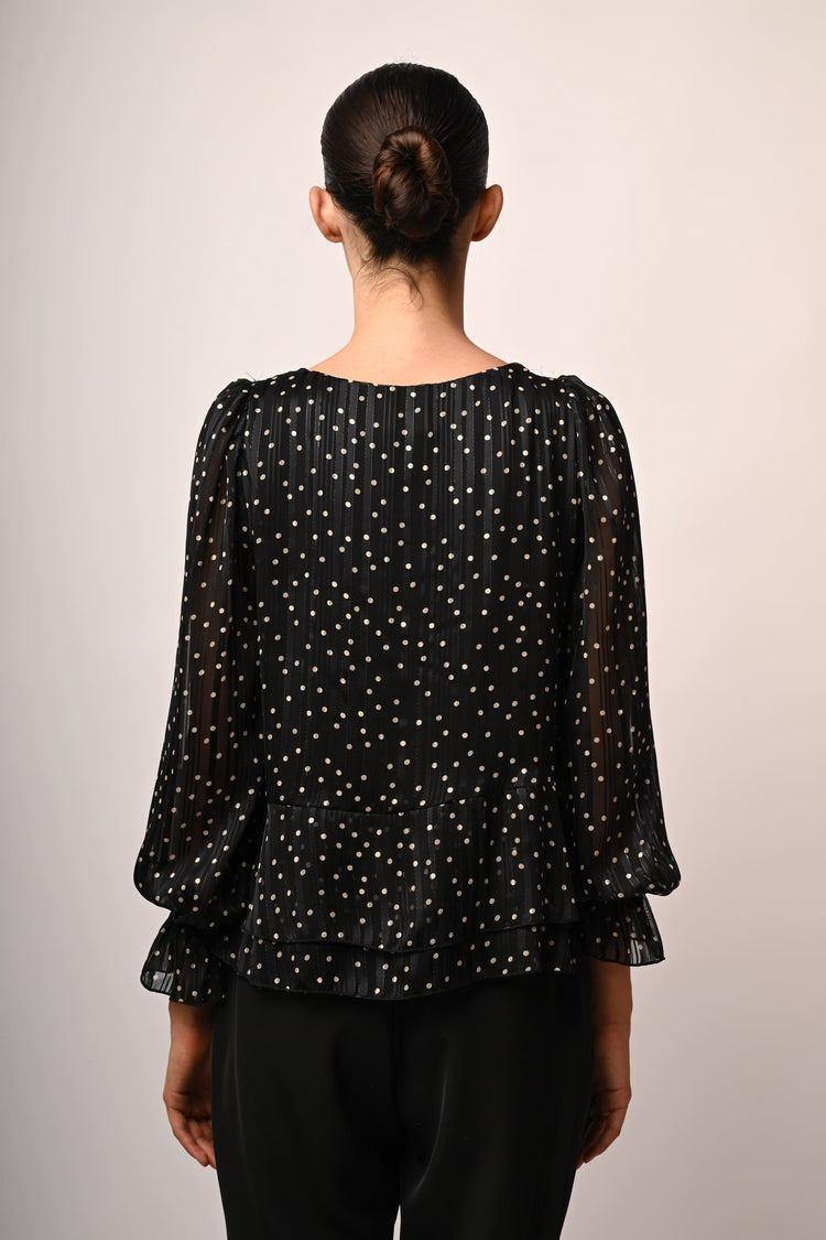 Ruffled polka dot blouse