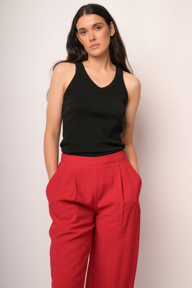 Red cropped trousers with hem buttons