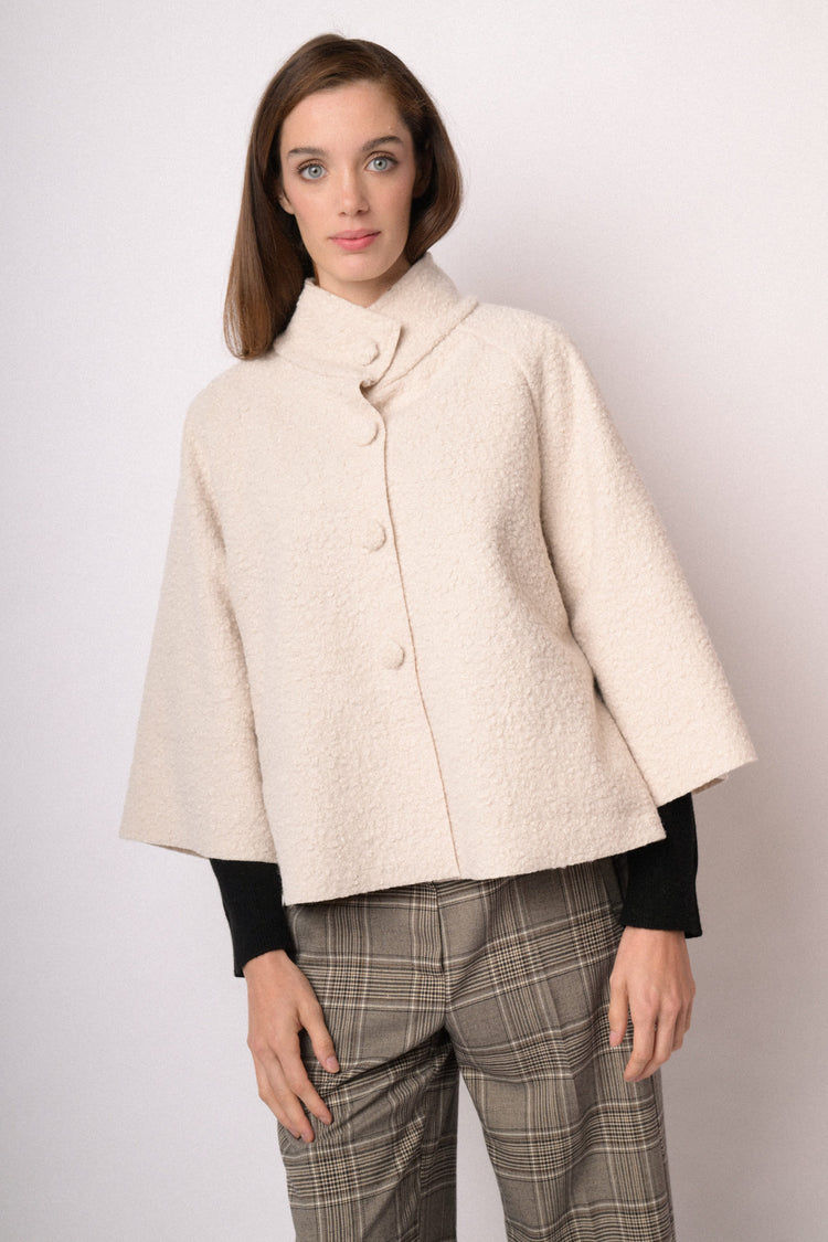 Beige short cape with high collar