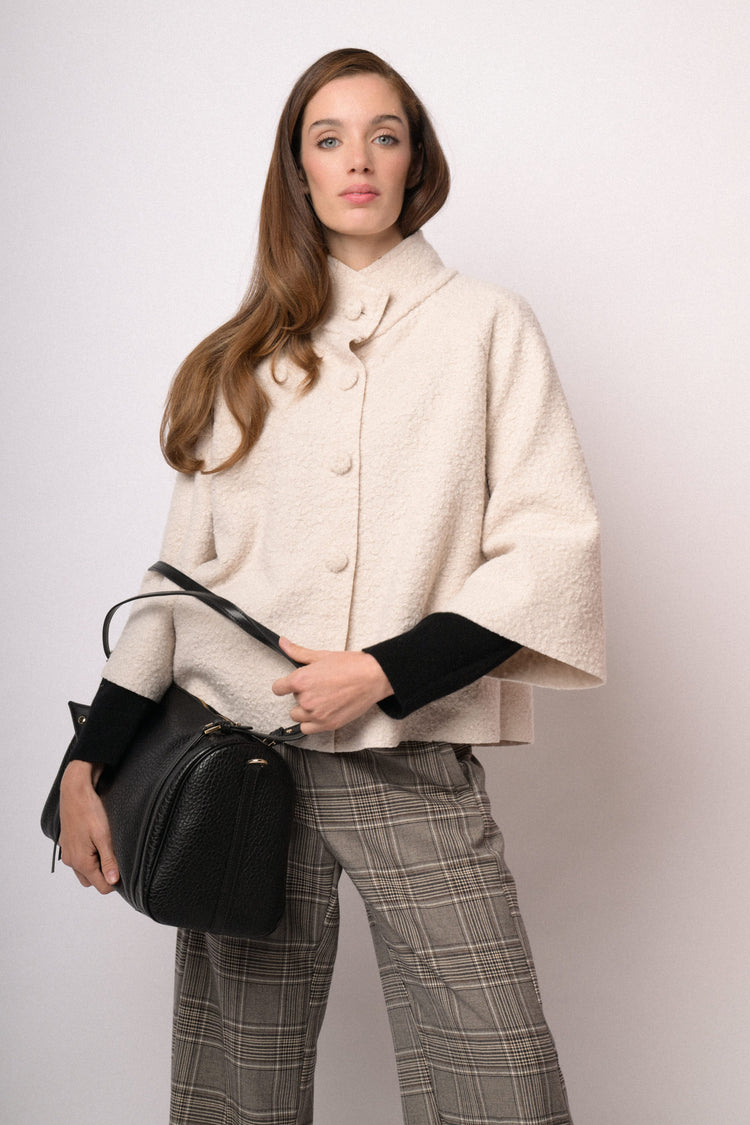 Beige short cape with high collar