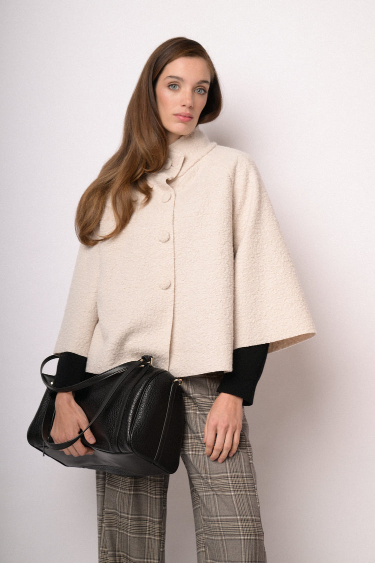 Beige short cape with high collar