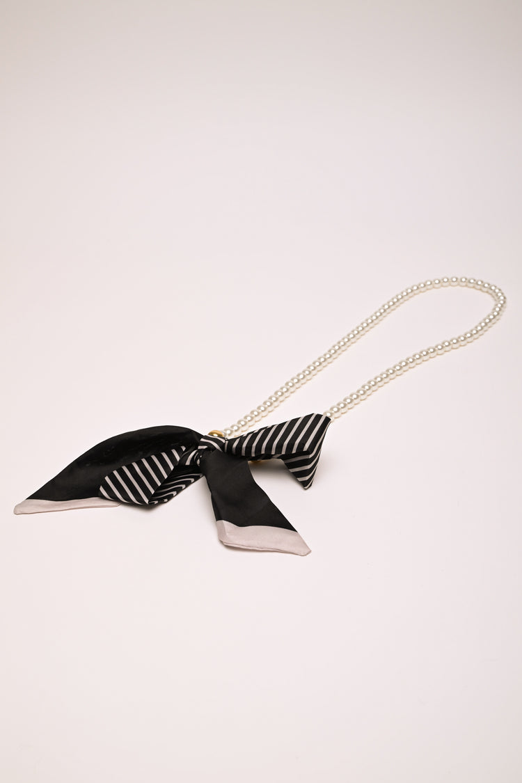 Bow and faux leather smartphone holder