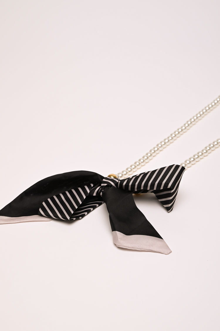Bow and faux leather smartphone holder