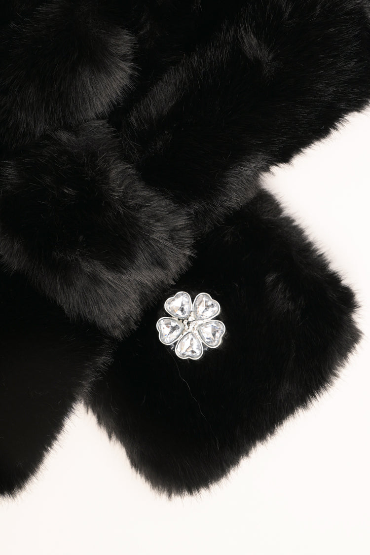 Black plush neck warmer with jewelled flower