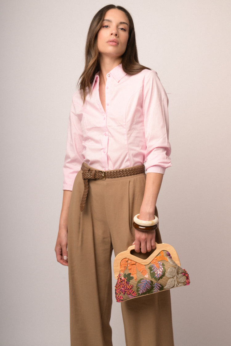 Pink shirt with rhinestone button